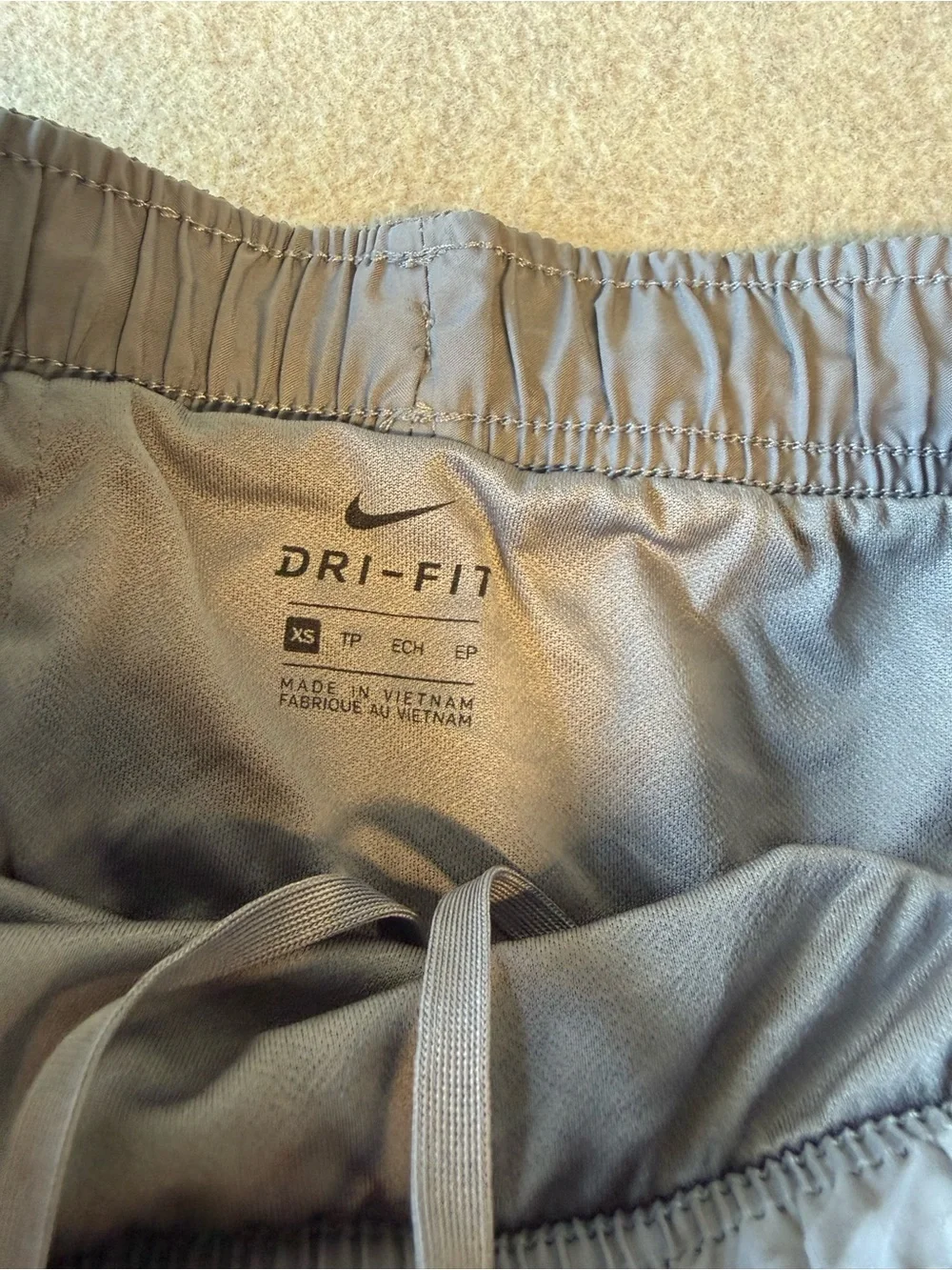 Nike Women's Heather Gray Athletic‎ Shorts with White Swoosh